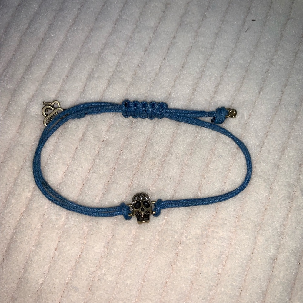 2/$15 adjustable blue cord gold skull bracelet